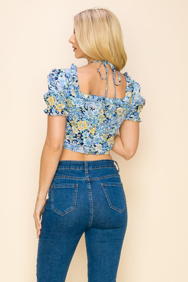 Multi color floral crop top with short sleeves and cut out design